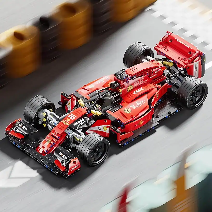 Lego Ferrari Formula 1 race car on a racing track, detailed and realistic model, high speeds, motion blur, competitive racing scene, ideal for toy and sports car enthusiasts, showcasing LEGO craftsmanship.