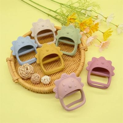 Cute lion-shaped soft silicone hair clips in pastel colors on wicker tray, ideal for kids girls, trendy fashion accessory for children, Monalisa Medical Store.
