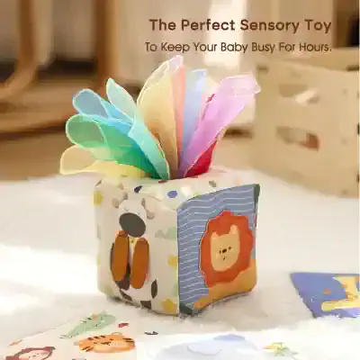 Colorful sensory plush toy cube for babies, featuring animal designs and soft fabric, ideal for infants' tactile development and sensory play. Perfect for early childhood learning activities.