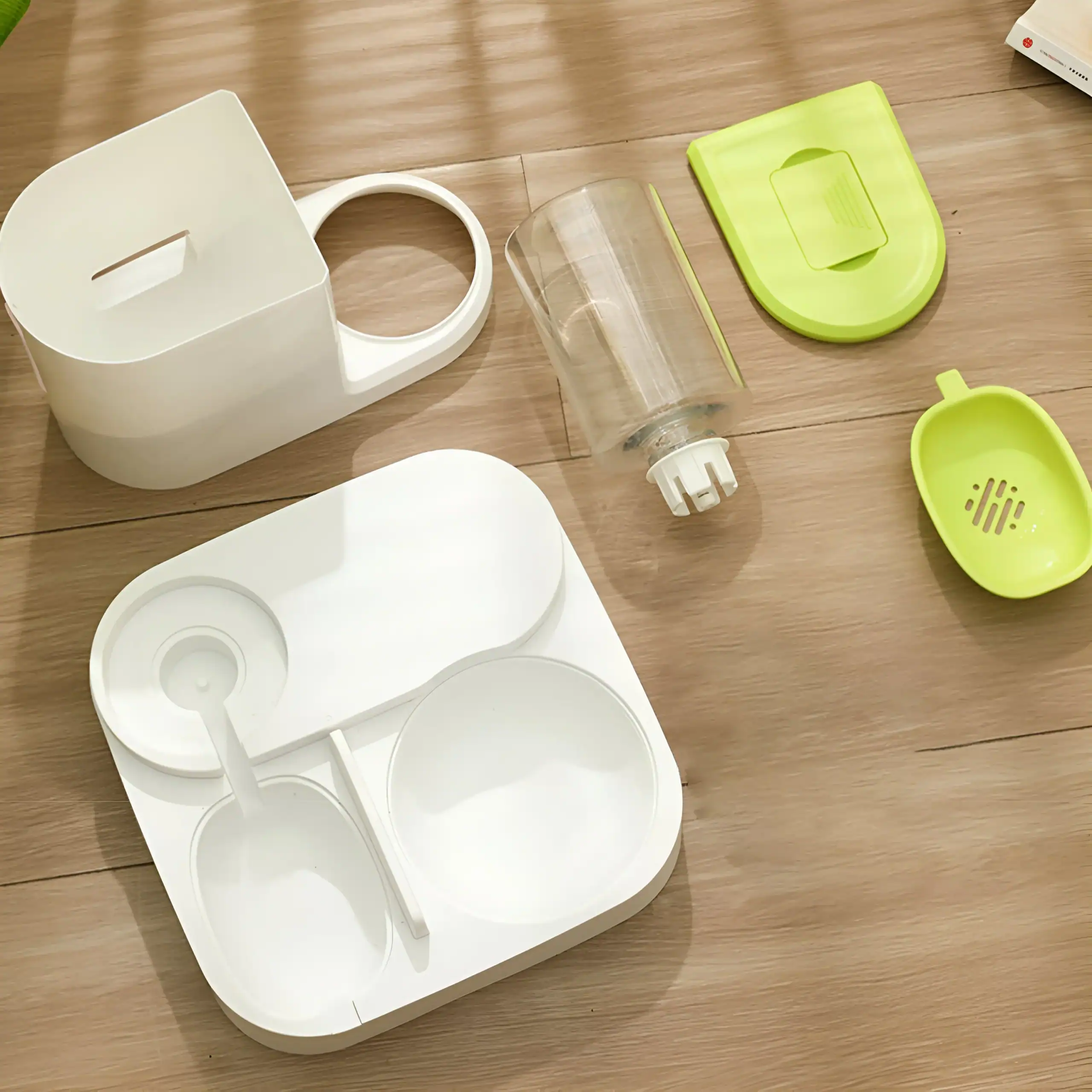 Silicone ear cleaning tool kit with a white and green suction cup, cleaning pod, and storage case from Monalisa Store for ear hygiene and personal care.