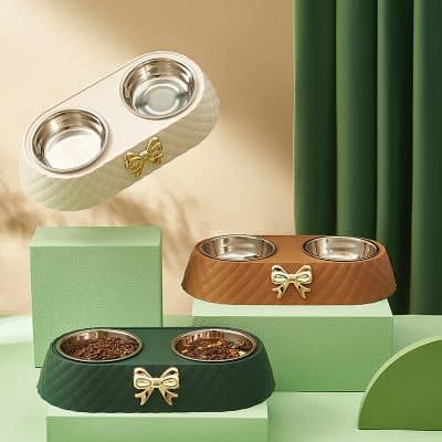 Double pet bowl set with decorative bow, available in white, brown, and green, perfect for stylish and functional pet feeding at Monalisa Store.