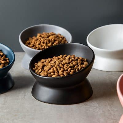 High-quality pet food bowls in black, white, and pink, ideal for premium pet feeding and food presentation. Durable ceramic bowls suitable for dogs and cats, available at Monalisa Medical Store.