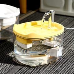 Water flosser in use at Monalisa Store for dental care, showing oral hygiene device with water reservoir and electric plug.