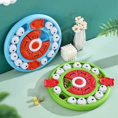 Colorful children's board game with rotating mechanisms, suitable for family fun and cognitive development, displayed on a modern tabletop with decorative flowers.