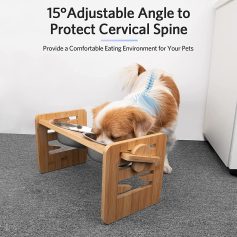 A dog eating from a stainless steel bowl on a wooden stand, designed to provide a comfortable eating environment with an adjustable angle to protect the cervical spine.