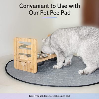 Pet pee pad holder with a cute gray cat eating from stainless steel bowls on a wooden stand, designed for convenient pet feeding and bathroom needs.
