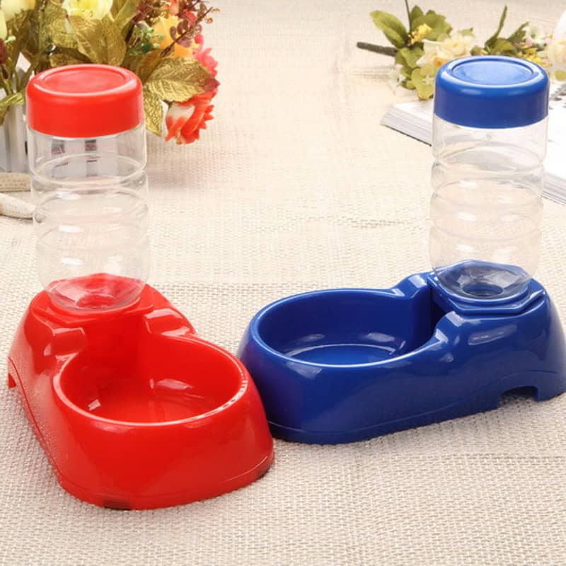 Red and blue dual pet feeding bowls with water dispensers, ideal for cats and small dogs, designed for easy feeding and hydration at Monalisa Store.