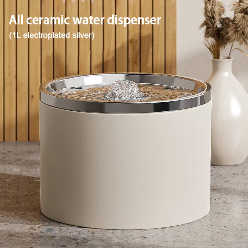 Ceramic water dispenser with silver electroplate, Monalisa Store opt, modern design, 1L capacity, suitable for home and office use.