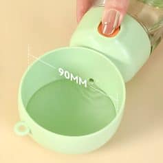 Nail polish remover bottle pouring into a green circular container, demonstrating precise application with a 90mm diameter for skincare or cosmetic purposes.