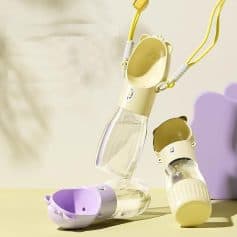 Recycling water bottles with colorful caps and attached straps, designed for eco-friendly use and portability. Perfect for sustainable living and environmental consciousness.