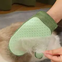 Shedding grooming brush for dogs with silicone bristles for effective fur removal and gentle comfort on pets.