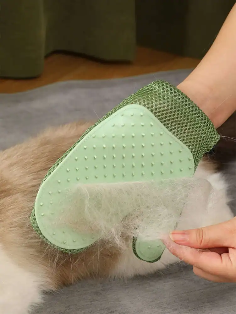 Shedding grooming brush for dogs with silicone bristles for effective fur removal and gentle comfort on pets.