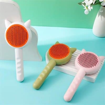 Silicone cat-shaped hairbrushes in pastel colors, ideal for gentle hair detangling and scalp massage, perfect for kids and adults.