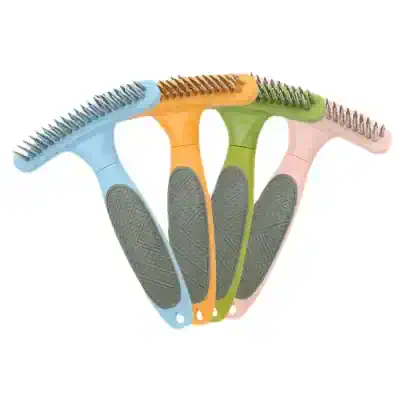 Blue, orange, green, and pink hairbrushes with textured handles and bristle patterns for effective scalp massage.