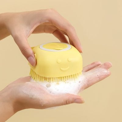 Yellow facial cleansing brush with smiley face design for skincare, exfoliation, and facial cleansing at Monalisa Store.