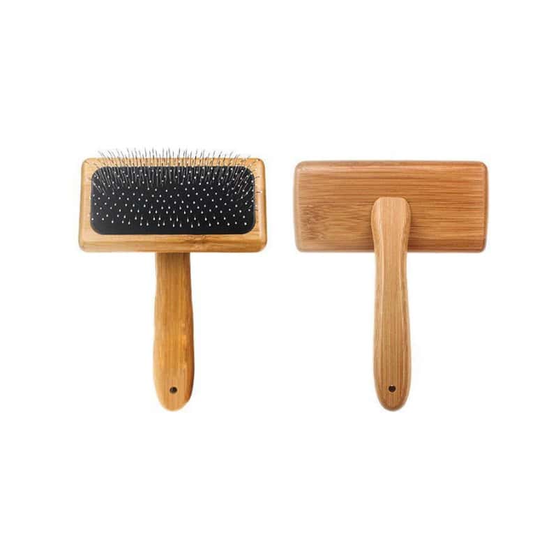 Wooden Pet Grooming Brush with rubber bristles for gentle brushing and deshedding. Eco-friendly bamboo handle for comfortable use and durability. Ideal for cats and dogs at Monalisa Store.