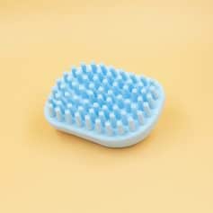 Blue silicone scalp massager pad for hair and scalp health, ideal for use in hair salons, spas, and at home. Promotes relaxation and stimulates scalp circulation for healthier hair growth.