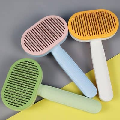 Colorful cat litter scoops with ergonomic handles, ideal for pet care, available at Monalisa Store for high-quality pet grooming and cleaning supplies.