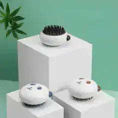 Hairbrush massager with cute animal face design, perfect for relaxing scalp massage and hair care, available at Monalisa Medical Store.