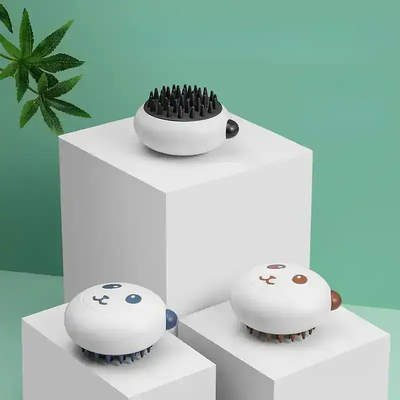 Hairbrush massager with cute animal face design, perfect for relaxing scalp massage and hair care, available at Monalisa Medical Store.