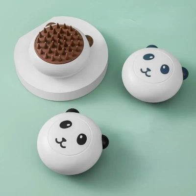 Panda-shaped chocolate fondue pots set on pastel background.