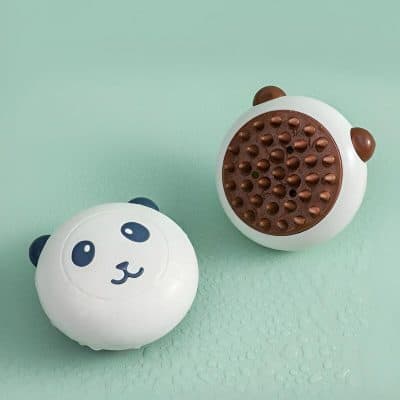 Panda-shaped ultrasonic essential oil diffuser on mint green background, cute and functional for aromatherapy and home wellness, perfect for kids' rooms or relaxation spaces.