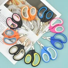 Colorful children's safety scissors with ergonomic handle design, perfect for arts and crafts, school projects, and educational activities. Easy to use and safe for kids.