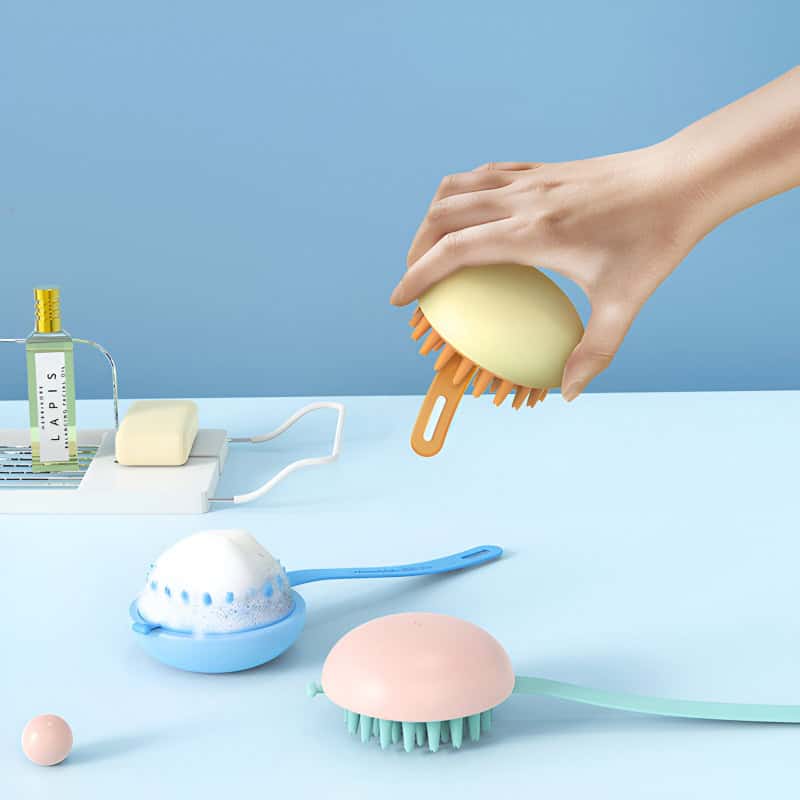 Multi-functional silicone body brushes with ergonomic handles for deep cleaning and exfoliation, displayed with skincare products on a pastel blue background, ideal for personal care and beauty routines.