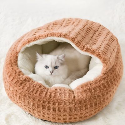 Soft plush cat bed in beige with cozy interior, perfect for small cats. Comfortable, warm, and stylish pet bedding for cats to rest and relax.