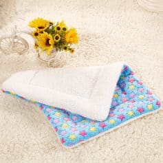 Fluffy baby blanket with colorful stars and white sherpa backing, cozy and soft for infant comfort, ideal for nurseries and gifting, from Monalisa Store.