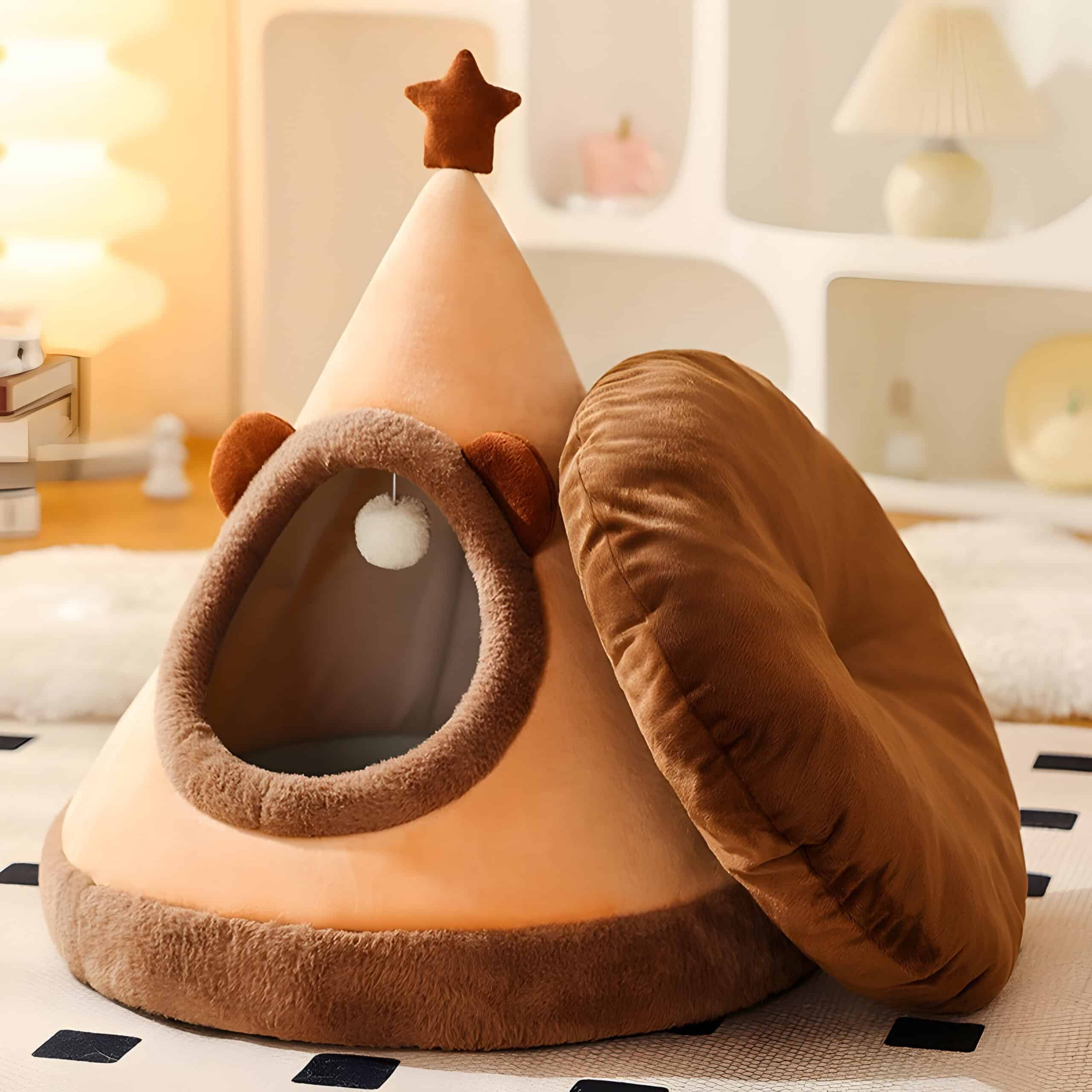 Cozy cat bed shaped like a teepee with a soft brown cushion, perfect for small pets, in a stylish and comfortable home setting. Ideal for providing pets with a warm, private resting space.