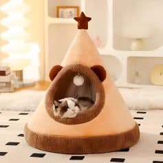Cosy cat bed shaped like a teepee with a sleeping cat inside, perfect for pet comfort and style, ideal for cat lovers and home decor, Monalisa Store.