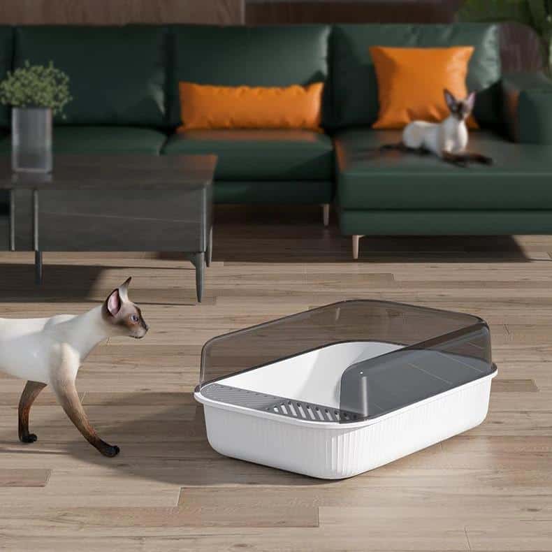 Sleek modern cat litter box with a transparent cover, designed for easy cleaning and odor control, perfect for pet owners seeking stylish and functional litter solutions.