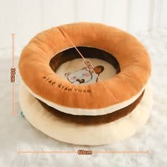 Soft plush cat bed with a snack-inspired donut design, 60cm diameter and 30cm height, perfect for cozy pet relaxation in stylish home decor.