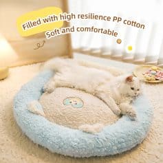Plush round cat bed filled with high resilience PP cotton, soft and comfortable for pets, ideal for cats. Perfect for cozy sleeping and lounging in a stylish pet space.
