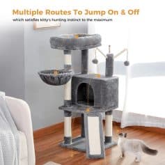 Aesthetic grey multi-level cat tree with multiple platforms, cozy hideouts, and sisal scratching posts, perfect for feline play and relaxation, available at Monalisa Store.