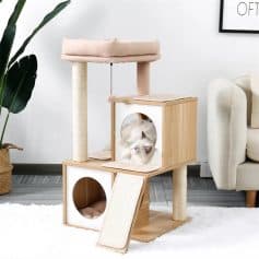 Modern wooden cat tree with sisal scratching post, cozy cubbies, and plush cushions for cats to play, scratch, and relax. Perfect for pet lovers seeking stylish cat furniture for their home.