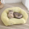 Fluffy gray cat lying on a yellow pet bed with floral embroidery, comfortable and stylish pet furniture for cats, cozy home pet accessory, Monalisa Store.