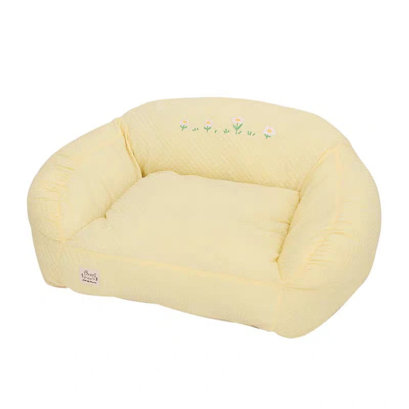 Soft yellow baby sofa with floral embroidery, perfect for child comfort and nursery decor. Made from plush, hypoallergenic materials for safe and cozy seating. Ideal for relaxing and playtime.