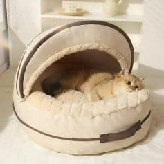 Soft plush pet bed with a cozy enclosed design, perfect for cats or small dogs to relax comfortably; featured by Monalisa Store.