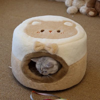 Fluffy cat bed with cat sleeping inside, cozy pet furniture for cats, adorable cat house, plush cat condo, Monalisa Store pet accessories for comfort and style.