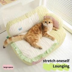 Stretch oneself lounging cat on cozy pet sofa, spacious and comfortable cat furniture, ideal for relaxation and naps, suitable for indoor pets, soft cushioning, pet-friendly design, ideal for cats of all sizes.