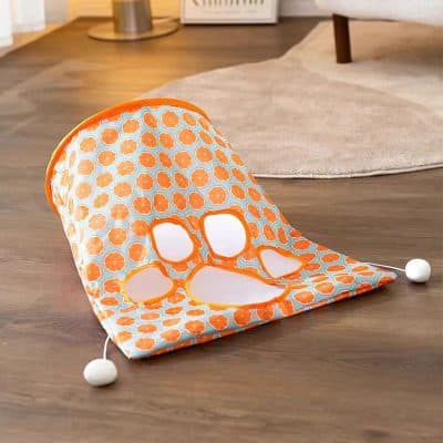 Bright orange and white citrus-themed baby bath seat with adjustable safety straps, designed for comfortable and secure bath time for infants and toddlers. Perfect for families seeking safe bathing solutions.