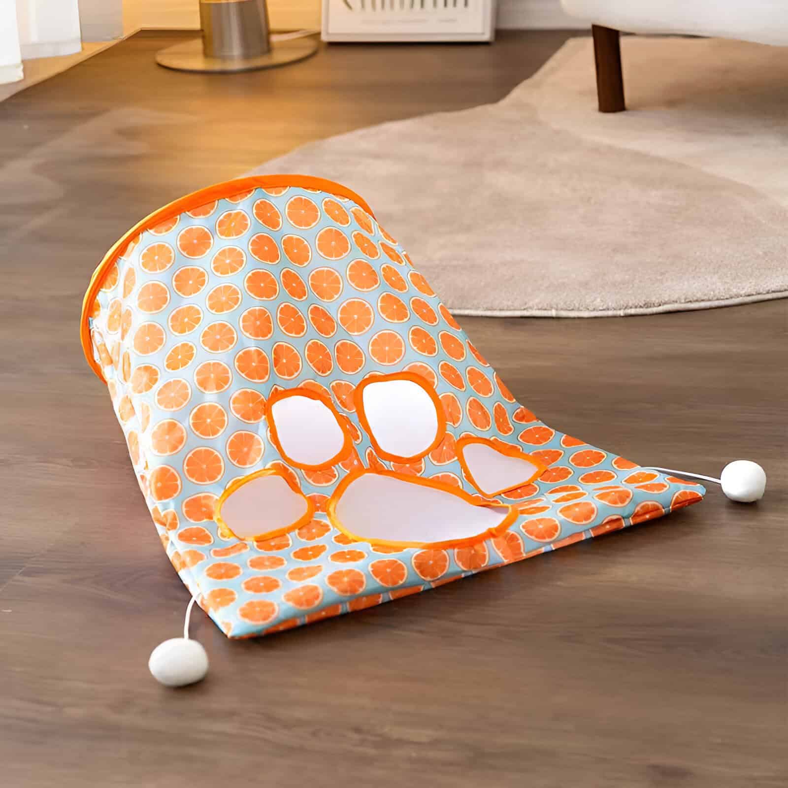 Bright orange and white foot massager with citrus fruit pattern, designed for relaxing foot therapy, portable and stylish, ideal for home or spa use.