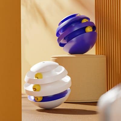 Blue and white spiral puzzle toy with yellow accents for stress relief and focus, modern design, displayed on a light wooden pedestal in a minimalist setting, suitable for wellness and mental health improvement.