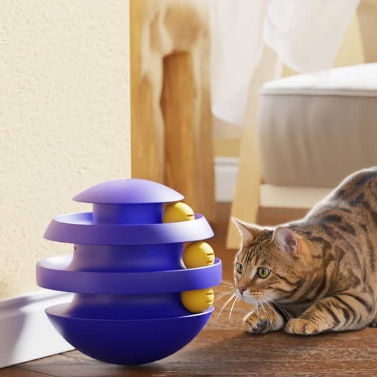 Silicone cat toy with rolling balls, interactive play for cats, purple toy with yellow balls, engaging feline toy for mental stimulation, Monalisa Store.