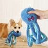 Soft plush octopus dog toy for pets, made with durable fabric and fun design, ideal for playful dogs and pet lovers. Perfect for enrichment and comfort.