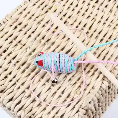 Brightly colored woven cat toy with feathers and jingle bell, designed for pet play and enrichment. Perfect for cats that love interactive and stimulating toys for healthy activity.