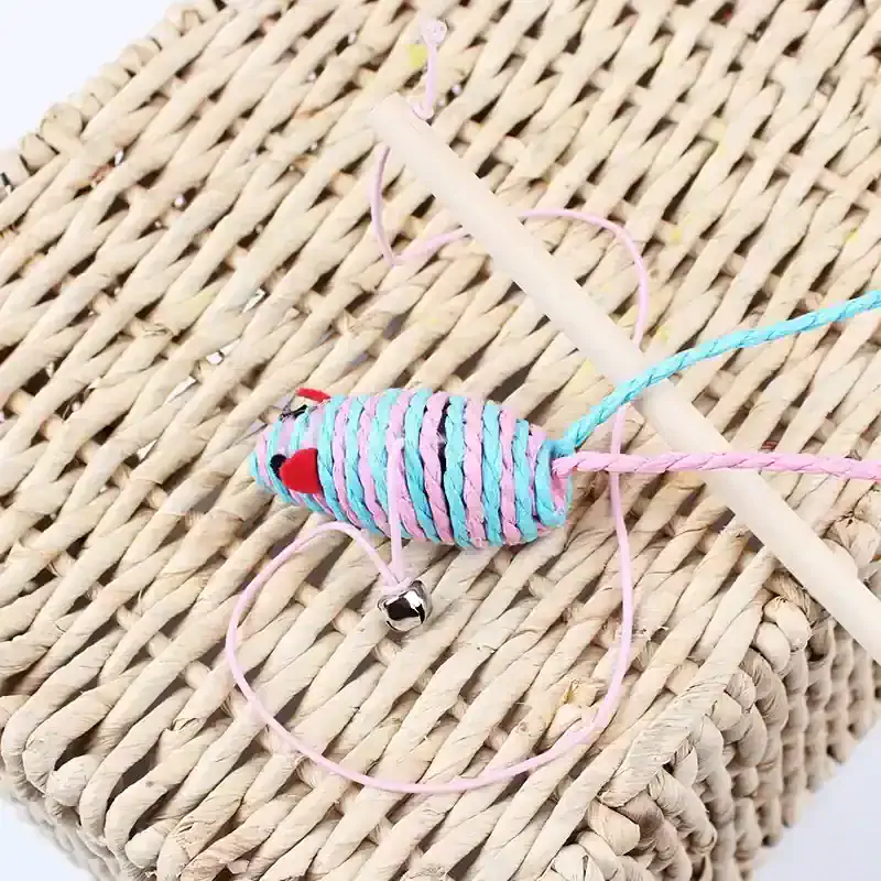 Brightly colored woven cat toy with feathers and jingle bell, designed for pet play and enrichment. Perfect for cats that love interactive and stimulating toys for healthy activity.