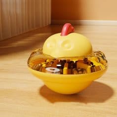 Yellow pirate ship-shaped candy container with a red handle, filled with assorted candies, designed for children’s toys and gift sets related to opt, eyewear, and accessories.